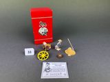 a red box with some small toys on it
