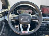 the interior of a car with a steering wheel and dashboard controls