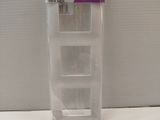 two clear plastic containers are sitting on top of a white counter