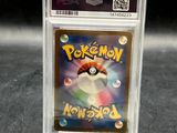 a close up of a pokemon card in a clear plastic holder