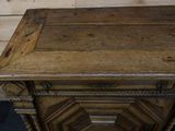 a wooden table with a drawer on top of it