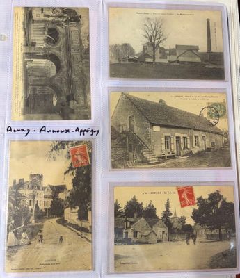 an old photo of a book with pictures of buildings and a clock tower