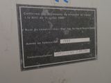 a sign on the wall of a building that says it is a construction site