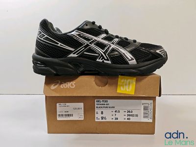 asics gelevo running shoes in a box on a table