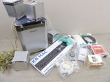 a lot of electronic items that are sitting on a table