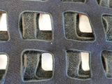 a close up of a piece of fabric with holes in it