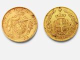 deux pièces d'or, dont l'une porte un blason et l'autre un blason de