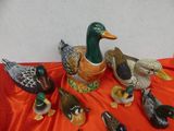 a lot of ducks that are sitting on a table
