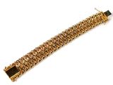 gold plated metal bracelet with a square clasp on a white background