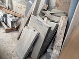 a pile of concrete blocks sitting in the corner of a room