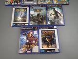 many video games on the table with a lot of them