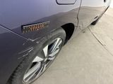 a close up of a car with a sticker on it