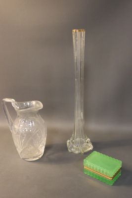 two vases and a soap dish sitting on a table