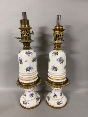 pair of antique porcelain candlesticks with purple flowers and gold trim