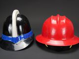 two hard hats that are sitting next to each other