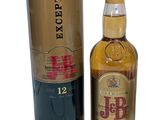 an image of a bottle of whisky next to a cardboard box