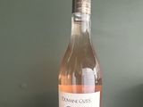 a bottle of wine that is sitting on a table