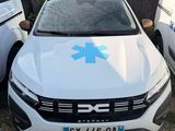 a white car with a blue star of life sticker on it