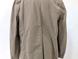 the back of a jacket on a mannequin stand