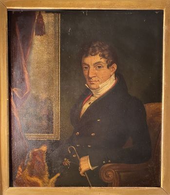 portrait d'un homme en manteau noir avec un chien
