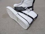 a pair of shoes that are on top of each other