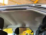 a view of the inside of a car from the driver ' s seat