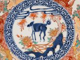 a plate with a picture of a dog on it