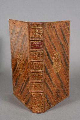 an old book that is sitting on a table
