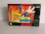 a close up of a box of nintendo games on a table