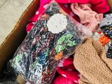 a box full of clothes and other items that are in it