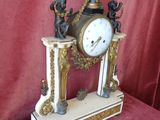 a clock that is sitting on top of a table