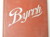an old red book with a white lettering on it sitting on a table