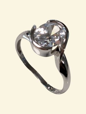 a ring with a large clear stone in it