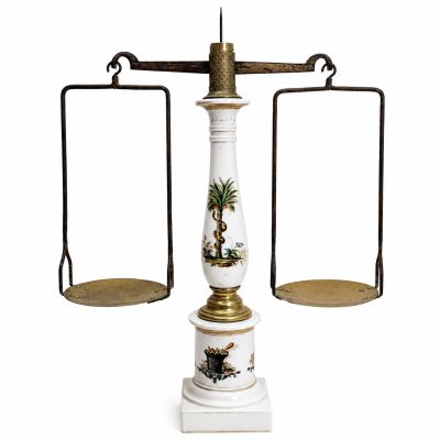 an image of a scale with two gold bars on it