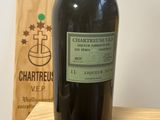 a bottle of wine that is sitting on a table