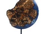 a large piece of wood that is on a stand