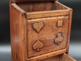 an old wooden chest with two drawers on top of it
