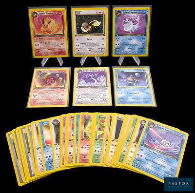beaucoup de cartes pokemon sur la table