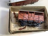 a box with a toy train in it sitting on a table