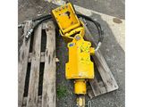 a yellow jack sitting on a pallet next to a wooden pallet