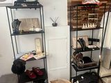 a room that has a shelf with shoes on it