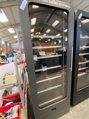 two glass doors that are open in a store
