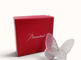 a red box with a white butterfly on it and a red box with a white butterfly on it