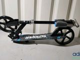 a scooter that is sitting on a table