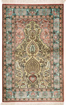 an antique persian rug with a floral design
