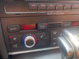 a close up of a car ' s dashboard with the controls on