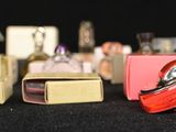 a lot of different colors of lighters on the table