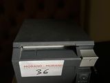 a small camera sitting on top of a box on a table
