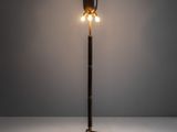 an image of a lamp that is on a stand in a room