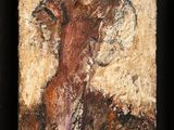 deux tableaux représentant un homme coiffé d'un chapeau et une femme en robe